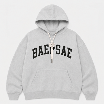 Gray hoodie with 'BAEPSAE' text on a white background