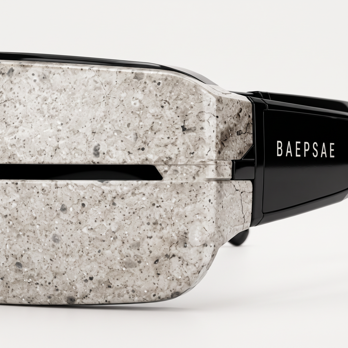 Close-up of BAEPSAE VEIL 01 stone resin frame texture and shield construction