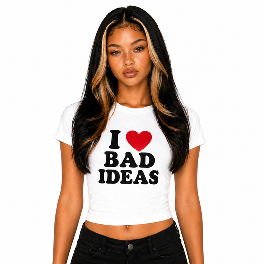 Woman wearing white I love bad ideas baby tee crop top