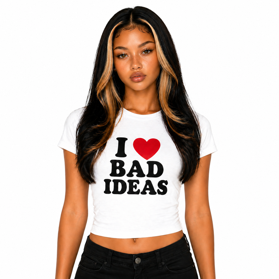 Woman wearing white I love bad ideas baby tee crop top