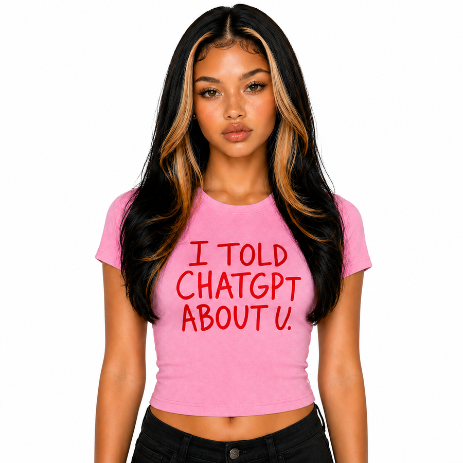 Woman wearing pink I Told ChatGPT About U baby tee