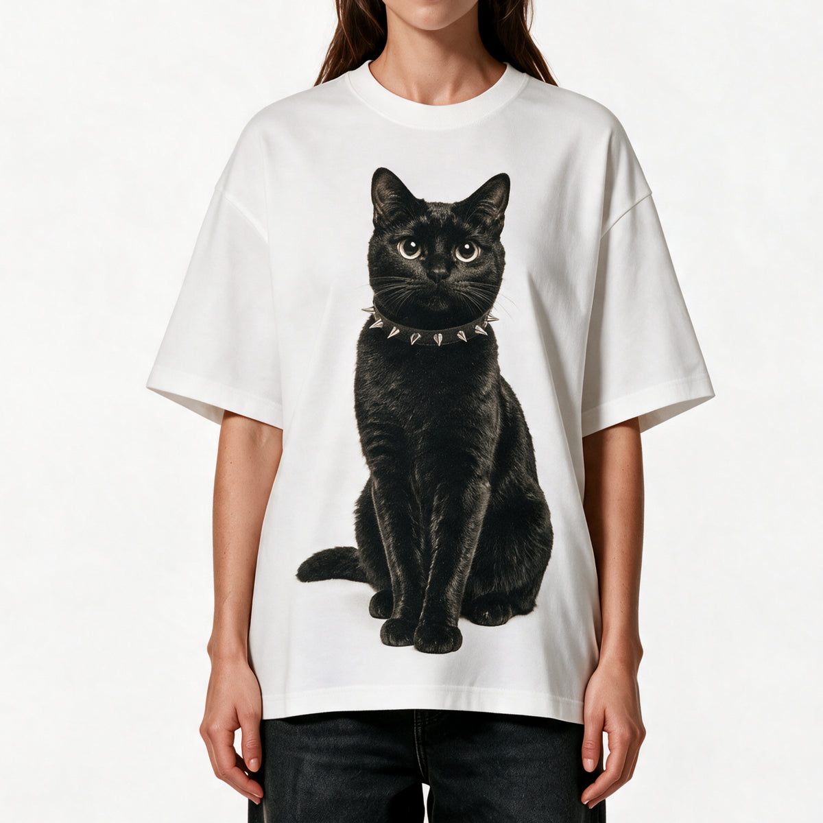 Woman wearing the white Kitty Gang Nior heavyweight oversized graphic tee