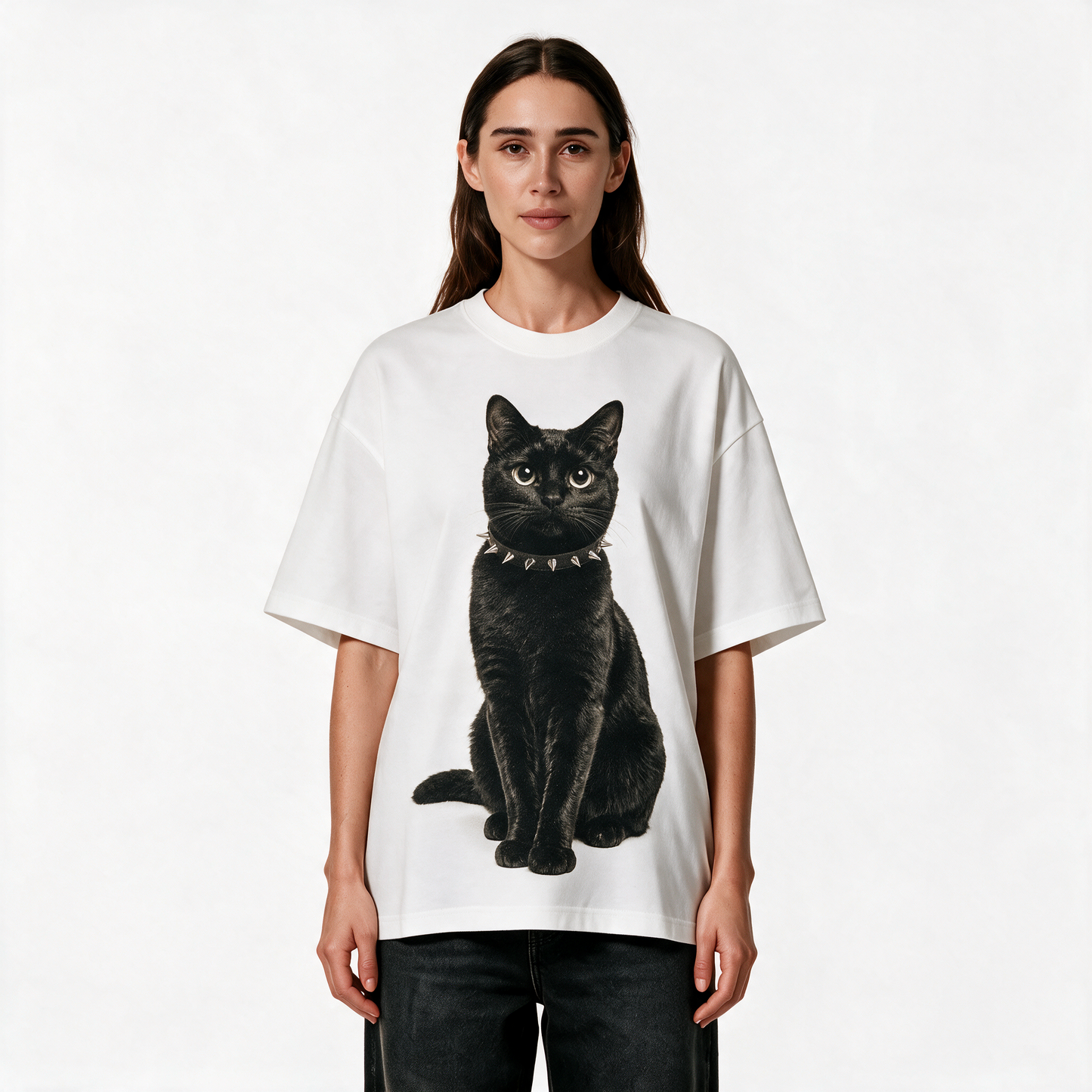 Woman wearing the white Kitty Gang Nior heavyweight oversized graphic tee