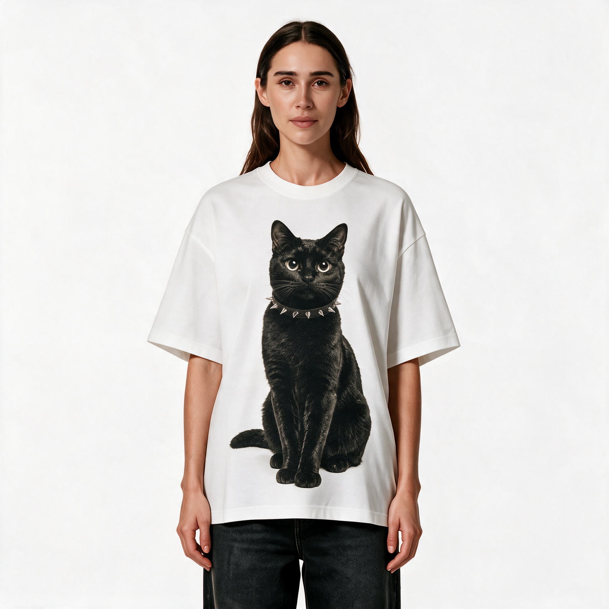 Woman wearing the white Kitty Gang Nior heavyweight oversized graphic tee
